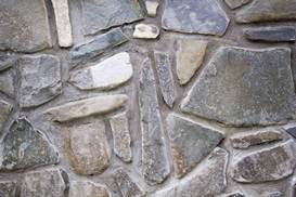 cement-wall-with-big-colored-stones